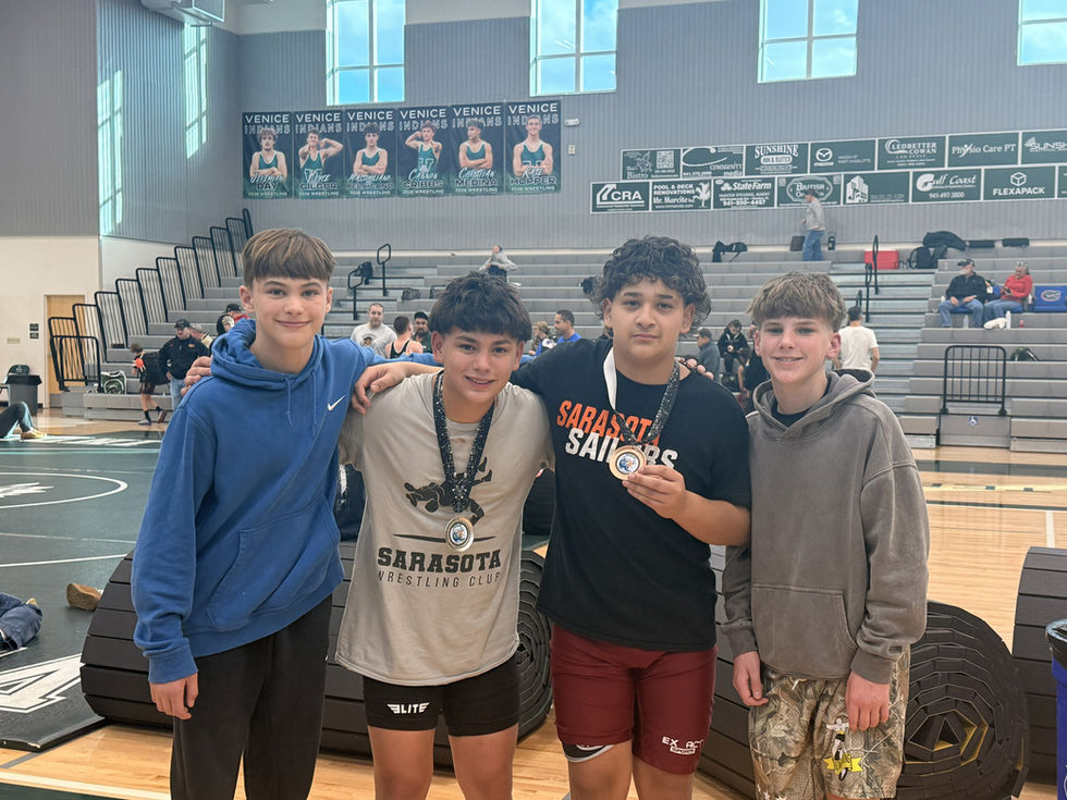 Sarasota Wrestling Club wrestlers competing at a youth wrestling tournament